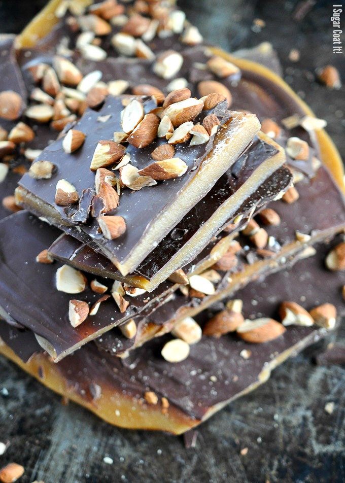 Almond English Toffee with homemade toffee sandwiched between thin layers of decadent dark chocolate and topped with roasted almonds.