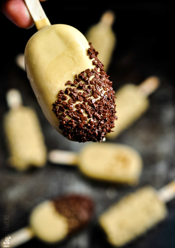 Hazelnut Milk Triple Chocolate Popsicles are a decadent blend of hazelnut milk, cocoa, dark and blond chocolate, dipped in praline and chocolate flakes.