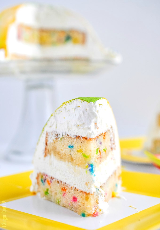 White Chocolate Coconut Mousse Funfetti Cake. Layers of funfetti cake and clouds of white chocolate mousse molded into a fun little cake to welcome spring!