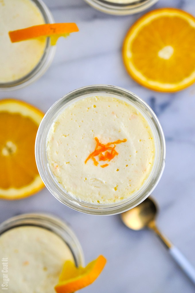 Single-serve jars of ginger cookie base and velvety, light-as-air Sous Vide Orange Mascarpone Cheesecake made with #TrestelleCheese.