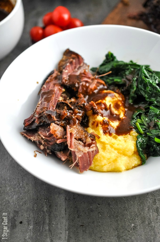 Slow-cooked to fall-off-the-bone, succulent perfection, Sous Vide Goat Shoulder with Polenta, Wilted Spinach and Garlic delivers flavourful comfort.